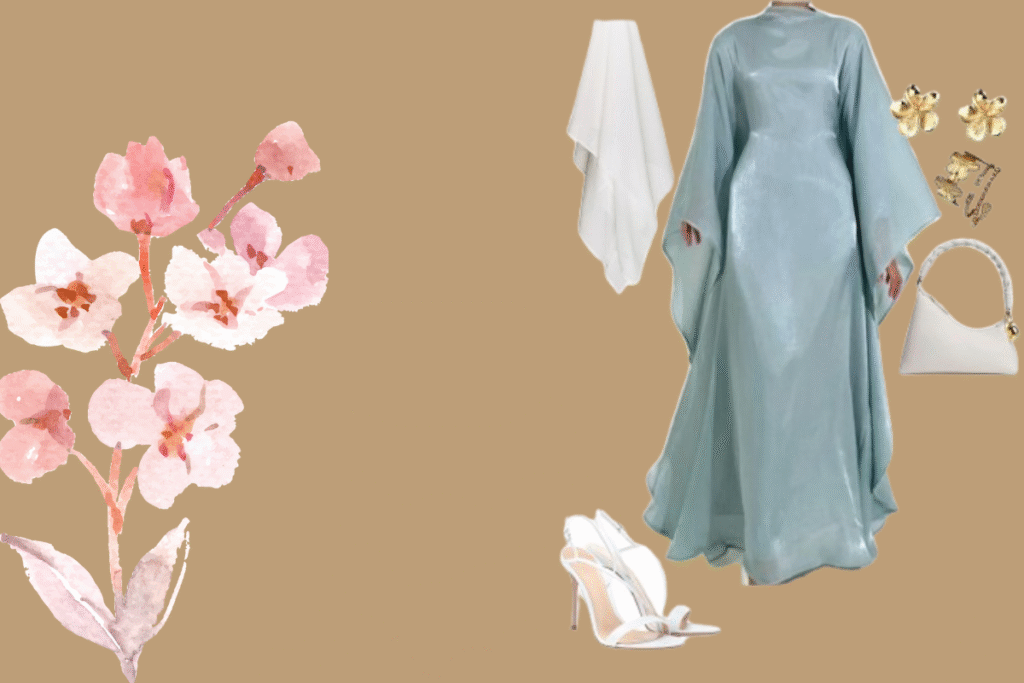 A pastel outfit flat lay with a light blue gown, white heels, handbag, headscarf, and gold earrings, next to pink watercolor flowers on a beige background.