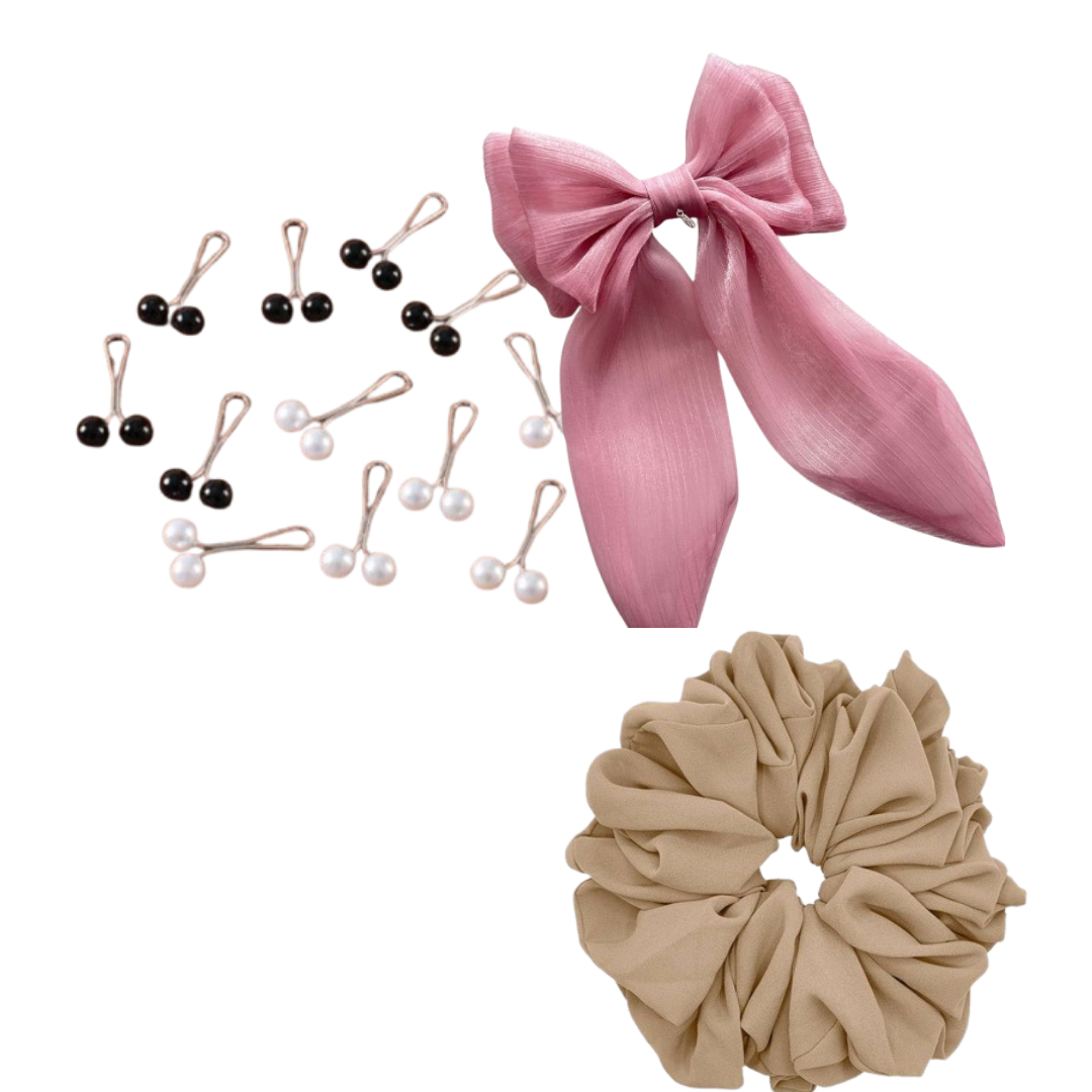 A collection of hair accessories including black and white pearl hairpins, a pink fabric bow, and a beige scrunchie.
