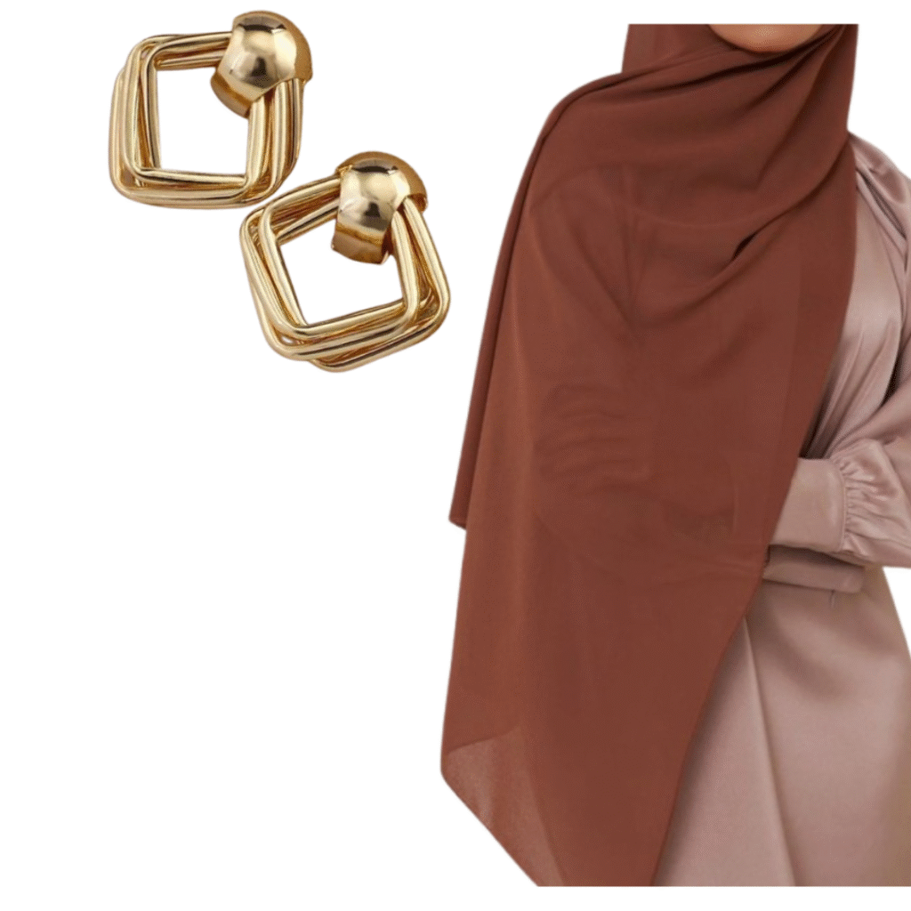 A brown hijab paired with gold geometric square earrings