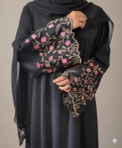 A two-panel studio image of a model wearing a dark brown, flowing abaya with white embroidered crescent moons on the sleeves, set against a smooth, warm beige background with soft shadows.